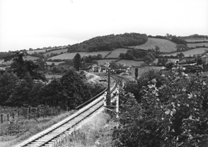 This view of Buckfastleigh station looking south from the Totnes Road bridge is today completely obliterated by the embankment of the A38 dual carriageway: a sad loss.