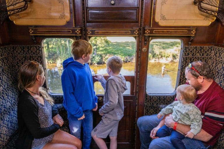 Family looking out of compartment